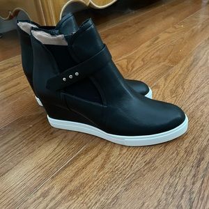 Linea Paolo black leather high top sneakers.   Size 7
